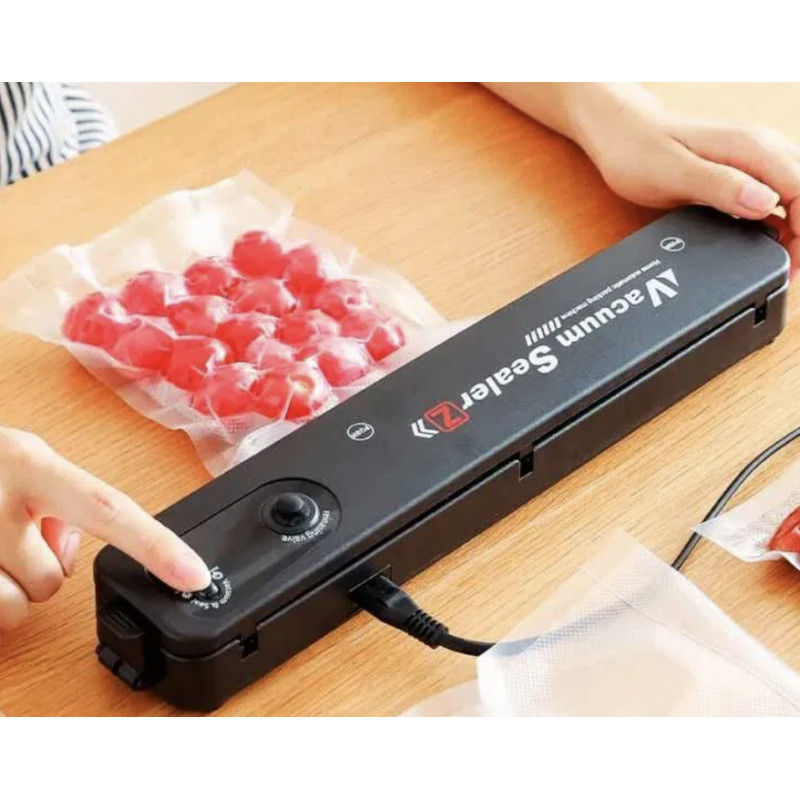 Машинка для вакуумування та запаювання пакетів ВАКУУМАТОР ECG Keep Freshness 8226, чорний / 8226